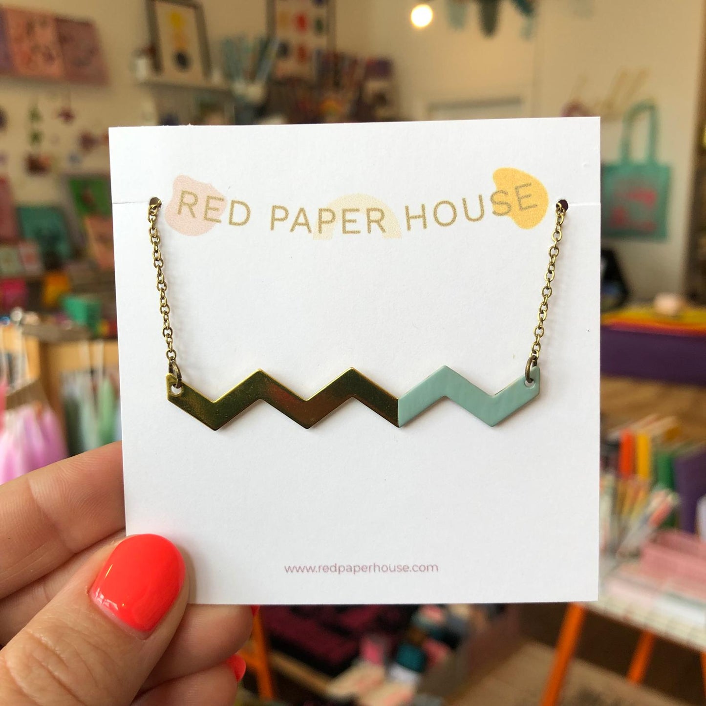 Red Paper House | Brass Zig Zag Wavy Necklace with Sage Accent